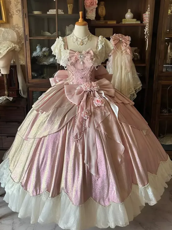 Robe Lolita féerique rose robe de bal ornée de perles et de fleurs n艙ud dans le dos bandage en dentelle manches en dentelle.