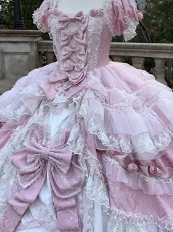 Robe Lolita rose féerique en dentelle n艙ud manches courtes longueur au sol