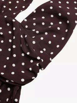 Robe longue dos nu à pois noirs et blancs pour femme décolleté plongeant en V sans manches fluide idéale pour l'été