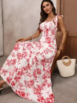 Robe longue d'été fluide à imprimé floral blanc et rouge pour femme col carré bretelles à nouer idéale pour la plage.