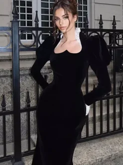 Robe longue élégante en velours noir avec détails en dentelle manches longues pour femme collection printemps 2026