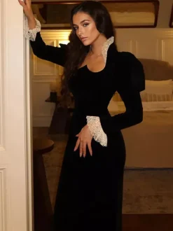 Robe longue élégante en velours noir avec détails en dentelle manches longues pour femme collection printemps 2026