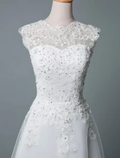 Robe mariée courte col rond en dentelle pailletes jupe en tulle zip sur dos Robe de mariage