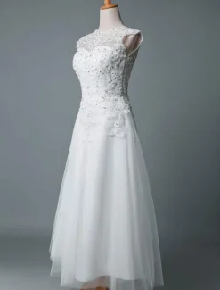 Robe mariée courte col rond en dentelle pailletes jupe en tulle zip sur dos Robe de mariage