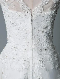Robe mariée courte col rond en dentelle pailletes jupe en tulle zip sur dos Robe de mariage
