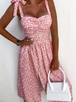 Robe midi rose en lycra spandex pour femme dos nu sans manches à fleurs et taille naturelle ornée de fleurs.