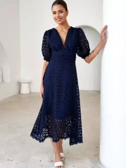 Robe mi-longue en dentelle à col en V et manches bouffantes pour femme (2026)