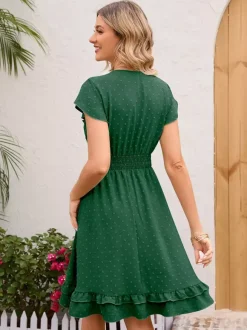 Robe mi-longue rose pâle à col en V et ourlet à volants avec taille froncée 2026