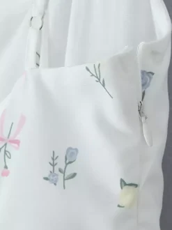 Robe mi-longue trapèze à imprimé floral et décolleté en c艙ur pour l'été 2026