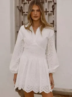 Robe mini à manches longues et 艙illets pour femme - Robe patineuse bohème à taille smockée et ourlet évasé - Idéale pour les vacances de printemps à la plage 2026