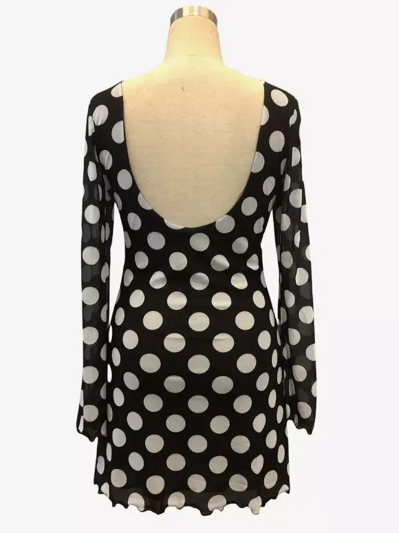 Robe mini moulante à pois manches longues et dos nu collection 2026