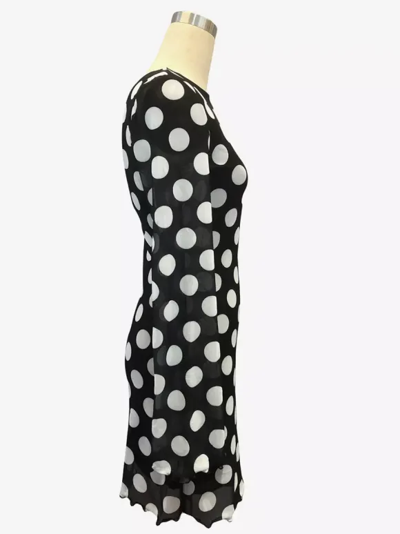 Robe mini moulante à pois manches longues et dos nu collection 2026