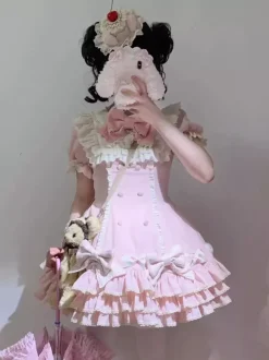 Robe Sweet Lolita rose à manches courtes volants et n艙uds avec chapeau.
