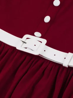 Robe trapèze à manches bouffantes col Peter Pan et broderies double épaisseur collection femme 2026