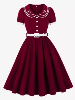 Robe trapèze à manches bouffantes col Peter Pan et broderies double épaisseur collection femme 2026