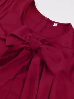 Robe trapèze à manches courtes et col rond ornée d'un n艙ud sur le côté collection femme 2026