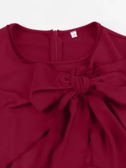 Robe trapèze à manches courtes et col rond ornée d'un n艙ud sur le côté collection femme 2026