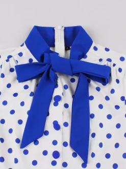 Robe trapèze rétro à pois patchwork col n艙ud papillon manches courtes collection 2026