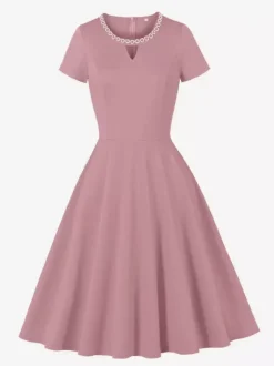 Robe cocktail swing vintage années 1950 manches courtes style rétro femme