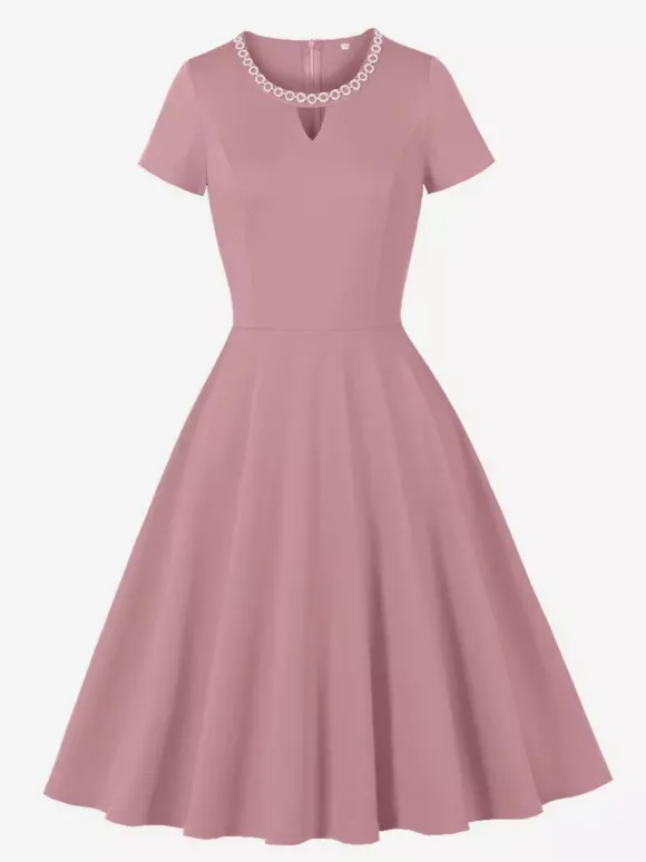 Robe cocktail swing vintage années 1950 manches courtes style rétro femme