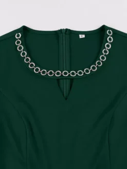 Robe cocktail swing vintage années 1950 manches courtes style rétro femme