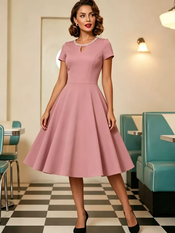 Robe cocktail swing vintage années 1950 manches courtes style rétro femme
