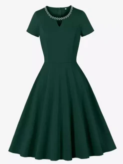 Robe cocktail swing vintage années 1950 manches courtes style rétro femme