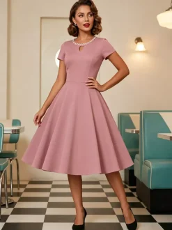 Robe cocktail swing vintage années 1950 manches courtes style rétro femme