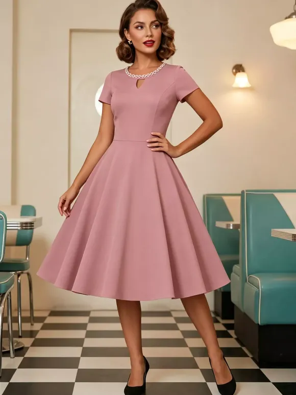 Robe cocktail swing vintage années 1950 manches courtes style rétro femme