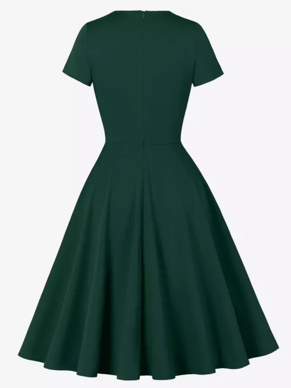 Robe cocktail swing vintage années 1950 manches courtes style rétro femme