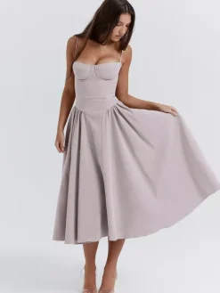 Robe corset rose pâle à bretelles spaghetti dos nu plissée mi-longue style cottagecore 2026