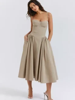 Robe corset rose pâle à bretelles spaghetti dos nu plissée mi-longue style cottagecore 2026
