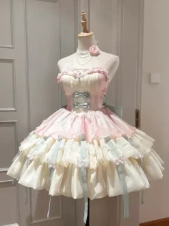 Robe courte Fairy Lolita sans manches en tulle rose abricot à volants et n艙ud avec traîne.