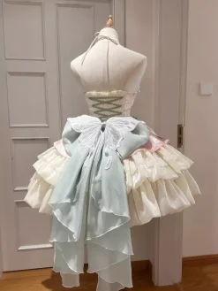 Robe courte Fairy Lolita sans manches en tulle rose abricot à volants et n艙ud avec traîne.