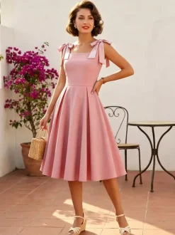 Robe de cocktail swing vintage années 1950 pour femme sans manches style rétro