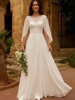 Robe de mariée avec châle coupe trapèze manches mi-longues dentelle col bijou
