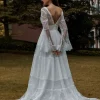 Robe de mariée bohème col V manche longue dos nu à traîne