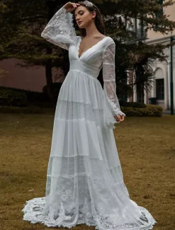 Robe de mariée bohème col V manche longue dos nu à traîne
