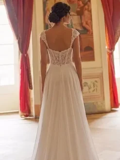 Robe de mariée civile trapèze décolleté c艙ur sans manches en dentelle style bohème