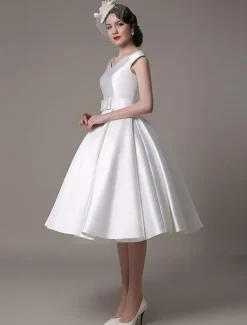Robe de mariée courte blanche en satin col V avec noeud boutonnée sur dos au genou Robe de mariage vintage