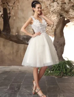 Robe de mariée courte robe de mariage tissu de pailletes décoré des fleur col v dos nu au genou