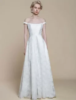 Robe de mariée simple en polyester à col bateau et fleurs en forme de A