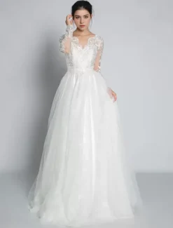 Robe de mariée simple robe de mariage en dentelle col V manche longue transparente décolleté à traîne
