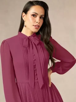 Robe de mère de la mariée décolleté travaillé manches longues coupe trapèze n艙uds robe d'invitée longue pour un mariage