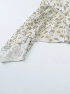 Robe de soirée léopard en polyester imprimé léopard sans manches dos nu asymétrique robe d'été
