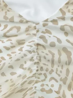Robe de soirée léopard en polyester imprimé léopard sans manches dos nu asymétrique robe d'été