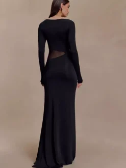 Robe de soirée maxi moulante à manches longues fente haute et découpes latérales en résille collection 2026