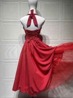 Robe de soirée mi-longue rose pâle à dos nu et coupe trapèze pour femme 2026