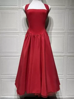 Robe de soirée mi-longue rose pâle à dos nu et coupe trapèze pour femme 2026
