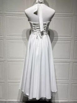Robe de soirée mi-longue rose pâle à dos nu et coupe trapèze pour femme 2026